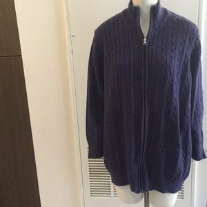 Woman within zip up cardigan